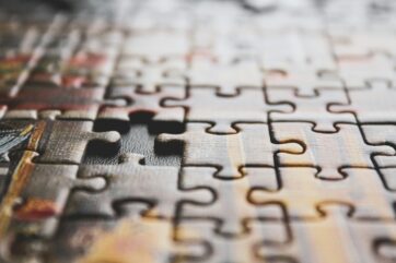Close-up of puzzle missing one piece