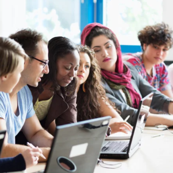 students looking at a computer